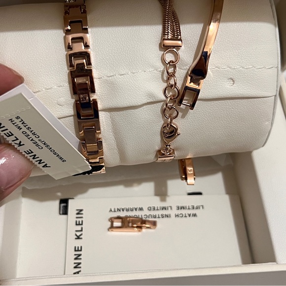 Rose gold watch and bracelets set